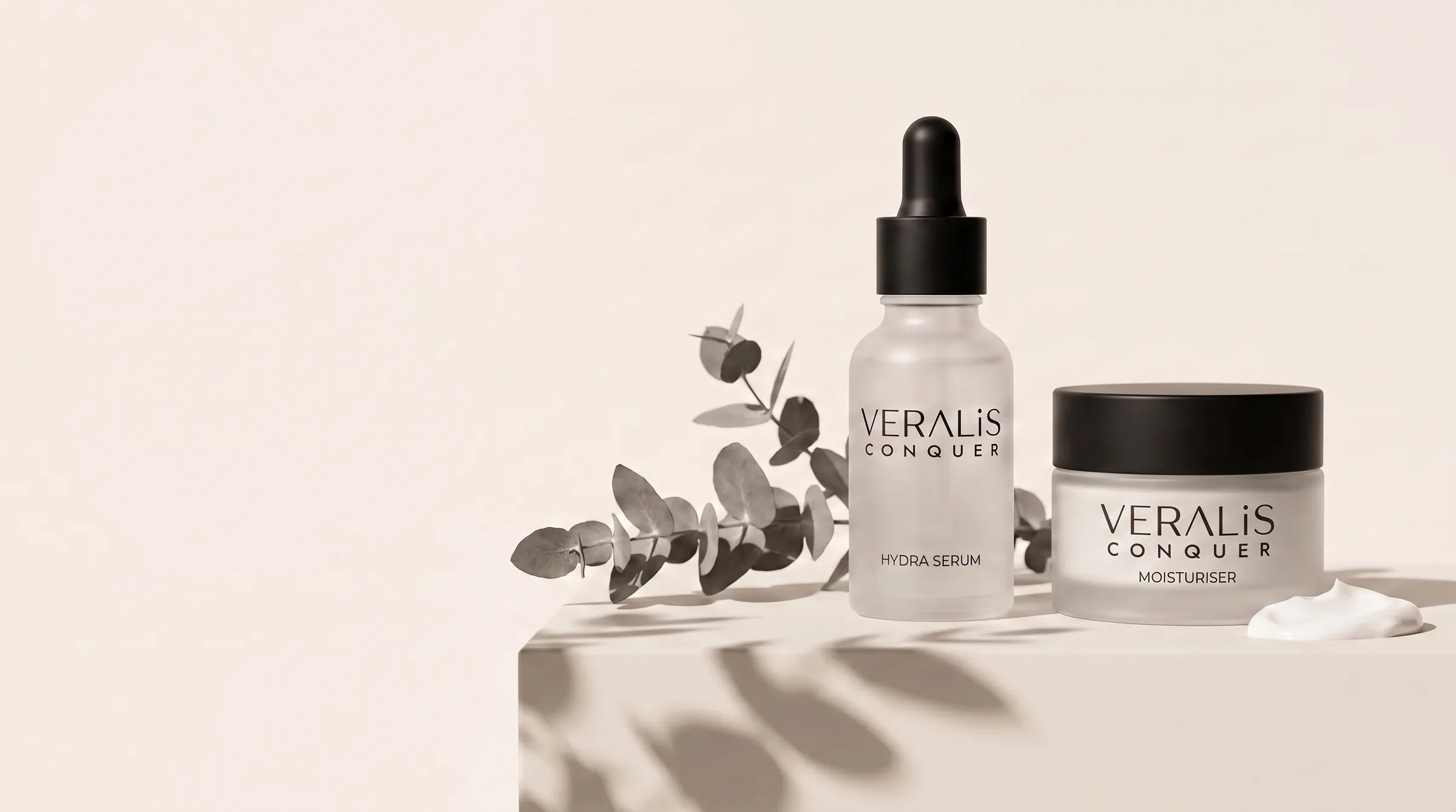 Veralis serum and moisturiser on a bone plinth with eucalyptus shadow